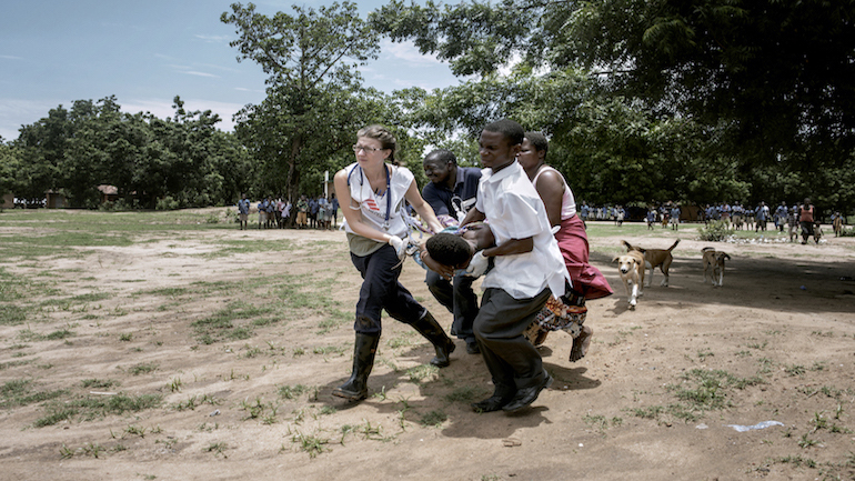 An MSF (Médecins Sans Frontières) nurse Kate Gannon leads the team who evacuate by helicopter 9 month pregnant Yanesi Fulakison, 38yo, who had pregnancy complications that prompted MSF staff on the field and from the emergency coordination office in Nsanje, to coordinate an emergency helicopter transport to the nearest hospital. Without urgent and immediate attention the lives of both mother and child were in jeopardy. Thanks to the rapidity of the response, after few hours Yanesi delivery by a cesarean surgery. Currently both of them are in good health.